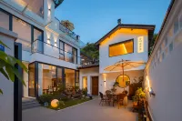 Floral Hotel·Tingyuan Residence (Qimen East Street Ancient City Store) Các khách sạn ở Kỳ Môn