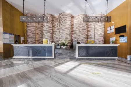 Roman Holiday Boutique Stay (Guangzhou Jianggao) Отели рядом с достопримечательностью «Guangdong Polytechnic Normal University (Baiyun Campus)»