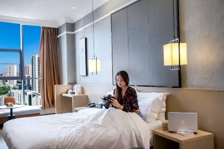 Haifei Hotel (Zhengzhou High-speed Railway East Station Convention and Exhibition Center) Отели рядом с достопримечательностью «Henan Agricultural University (Longzihu Campus)»