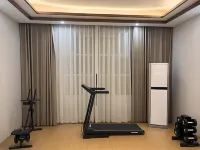 Four Seasons Smart Hotel (Zhoukou Passenger Transport Center Station)