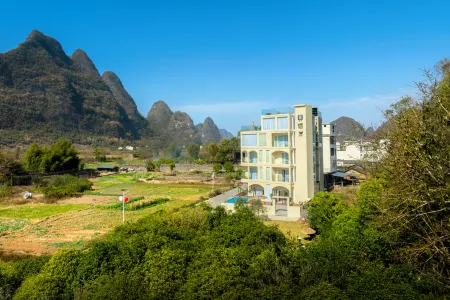 Yangshuo Qian'an Homestay (Yulong River Jiuxian Wharf Branch) Отели рядом с достопримечательностью «Yulong Bridge»