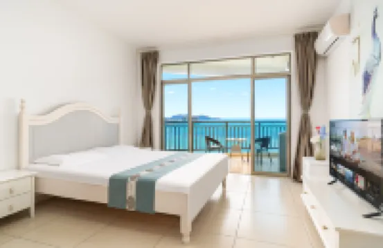 Sanya Red Orange Blue Dragonfly Homestay Hotel (Sanya Bay Haiyue Square Branch)