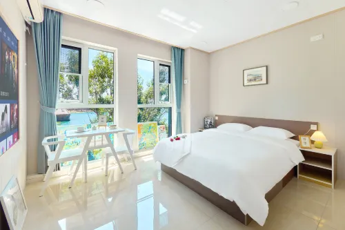 Seaside Anlewo Boutique Apartment (Qingdao Ferry Terminal Jinmao Bay Shopping Center)
