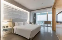Dalian Fense Shatan Seaview Langhua Richu Hotel (Jinshitan Resort Area Kuaile Haian)