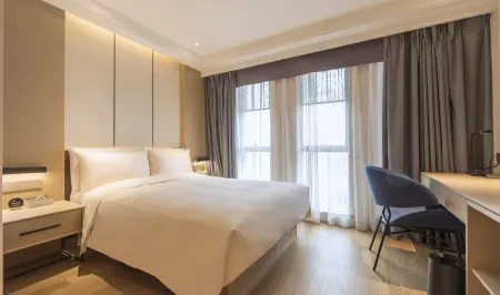 Zhengzhou Yunju Boutique Hotel (Zhengyi Shihao Xiaogongguan) Отели рядом с достопримечательностью «Henan Water Conservancy and Environment Vocational College»