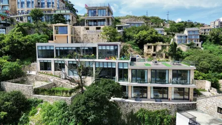 Zuoguan Shanhai Homestay (Wenling Shitang Golden Beach Scenic Area) Отели рядом с достопримечательностью «Wenling Shitang Peninsula Tourist Resort»