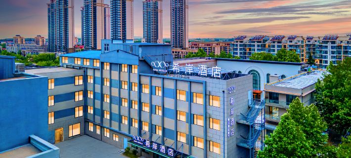 XaNa Hotel(Weihai Rushan Yiwu Small Commodity Chengnan Mountain Road Branch) Отели в г. Жушань