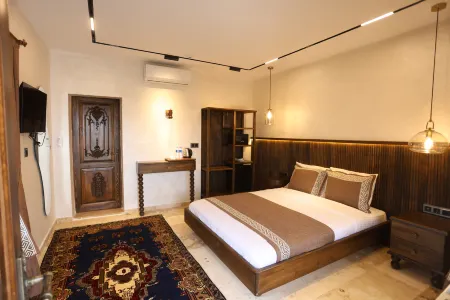 Erdu Cappadocia Stone House Hotel Отели в г. Аванос