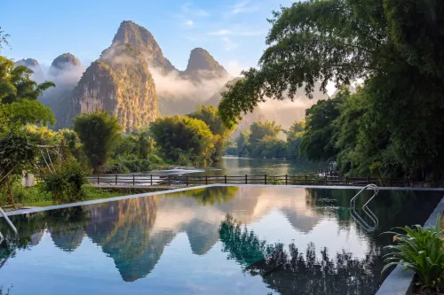 Qixi Meidi Ershisi Zhu Hotel - Inns