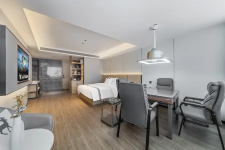 Wanyue Anman Hotel (Dongfang High-speed Railway Station Wanda Plaza) Отели в г. Дунфан