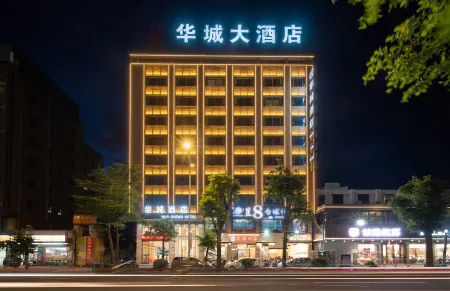 Huacheng Hotel Отели в г. Учуань