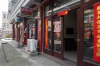 Wenling Warm Beach Homestay Отели рядом с достопримечательностью «Песок под дырой»