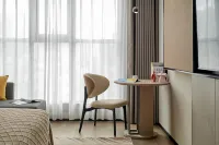 Jiulong Yipin Hotel (Pingba South Station District Government)