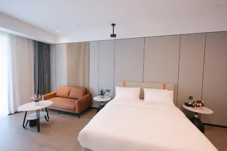 Qianye Hotel (Urumqi International Convention and Exhibition Center) Отели рядом с достопримечательностью «Xinjiang Institute of Light Industry Technology»