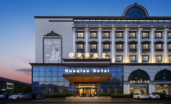 Huaqiao Hotel - Housity