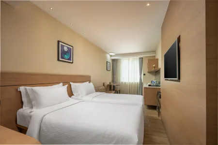 Zanzan Hotel Отели рядом с достопримечательностью «Harbin Railway Technical College Yantai Branch»