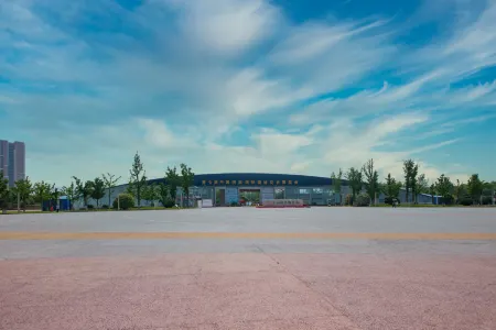 Tloml Hotel Отели рядом с достопримечательностью «Qilu University of Technology (Daxue Road)»