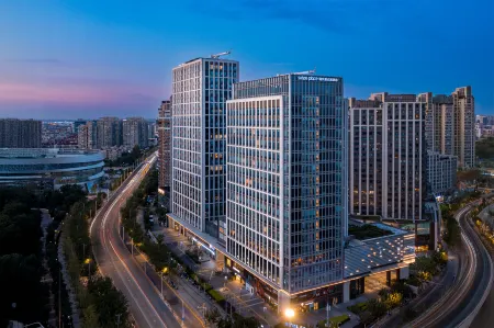 Suisse Place Serviced Apartment Shanghai Suhe Отели рядом с достопримечательностью «Shanghai University of Engineering Science (Xincun Road)»