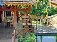 Jinghong Menghan Bole Homestay (Dai Garden) โรงแรมใกล้สวนไทลื้อ สิบสองปันนา