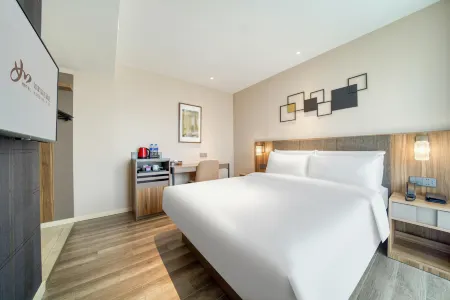 Home lnn (Shengzhou Wuyue Plaza Guanhenan Road Branch) Отели рядом с достопримечательностью «Huju Zoo»