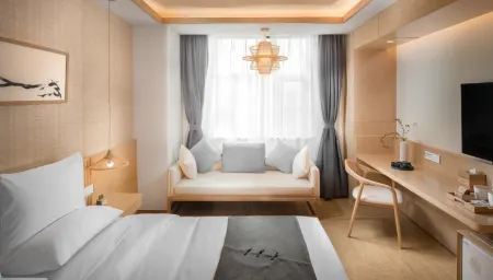 Shanghai Eting Apartment Отели рядом с достопримечательностью «Shanghai Jiguang Polytechnic College»