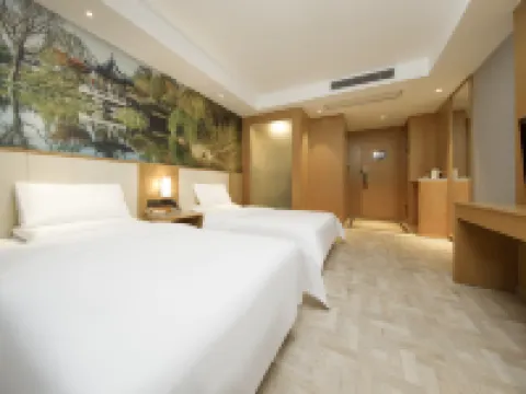 Yayue Hotel (Zhenjiang Railway Station North Square Xijin Ferry Store) โรงแรมในเจิ้นเจียง