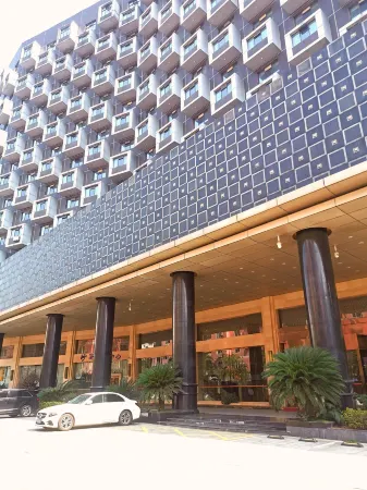 Pingjiang Sunshine Bamboo Hotel (Tianyue Bus Station) Отели в г. Пинцзян