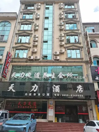 Xingren Tianli Hotel Отели в г. Синжэнь