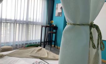 Weijian Hotel (Honggutan Wanda Branch)