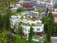 Huadi Hostel Отели рядом с достопримечательностью «Площадка для отдыха на пляже Солнечного залива»