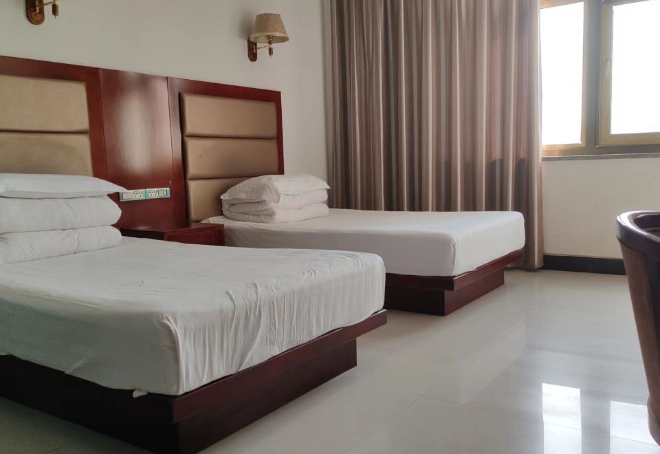 Yanchi Yongsheng Hotel 객실 이미지