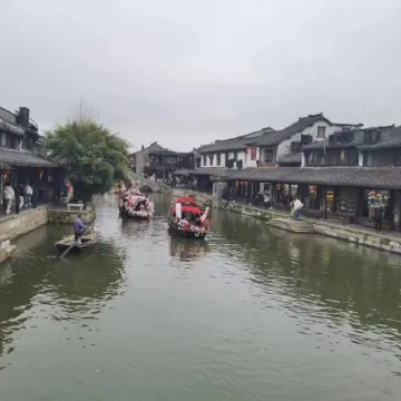 Xitang Muguang Qiyin Homestay Отели в г. Цзяшань