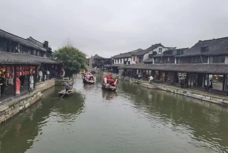 Xitang Muguang Qiyin Homestay Отели в г. Цзяшань