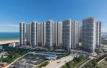 Wuchuan Le King Resort Apartment Отели в г. Учуань