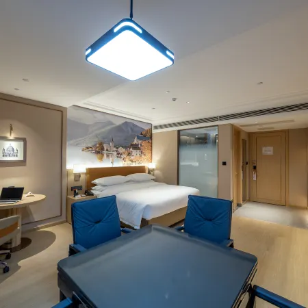 Vienna Hotel (Zhenfeng Branch) Отели в г. Чженьфен