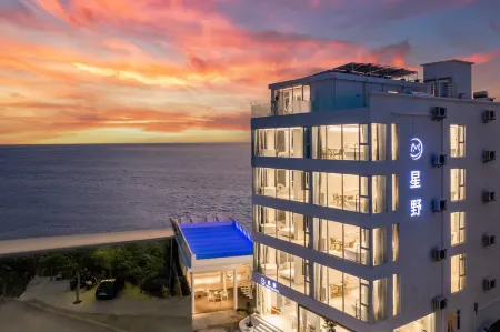 Sanya Xingye sea view design B & B Отели рядом с достопримечательностью «Tianyazhen»