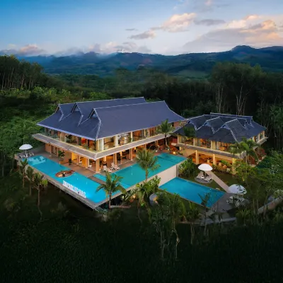 Three-color Yunhe B&B (Xishuangbanna Jinghong Mengxi Big Buddha Temple Manhona Branch) Hotels near Manhena Natural Village
