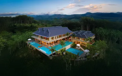 Three-color Yunhe B&B (Xishuangbanna Jinghong Mengxi Big Buddha Temple Manhona Branch) Ξενοδοχεία στην πόλη Mannongfeng International Tourist Resort