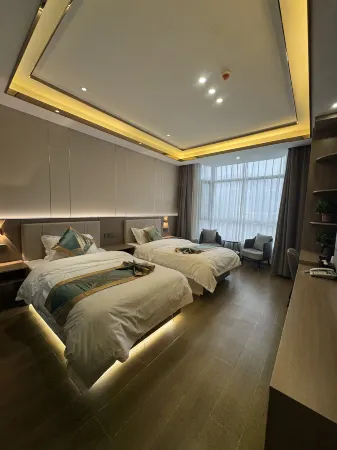 Hongtai Lihao Business Hotel Отели рядом с достопримечательностью «Linxia Fenghuang Shan Mudan Base»