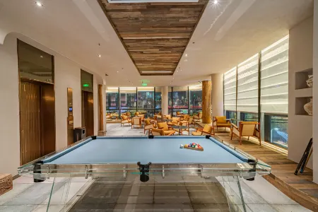 Chongqing Puyi ·RiverView Designer Holiday Homestay (Changjiahui Danzili Laojie Branch) Отели рядом с достопримечательностью «Tieshan Square»