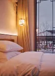 Xiuwen Yiyouju Homestay فنادق في شيو ون