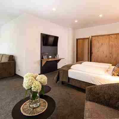 Hotel AlpinaRos Rooms