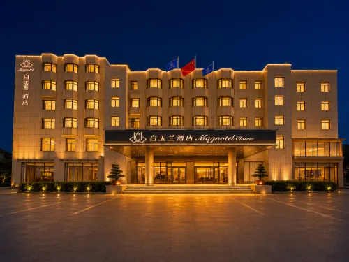 Magnolia Business Hotel (Yantai Longkou Heping Road Branch)