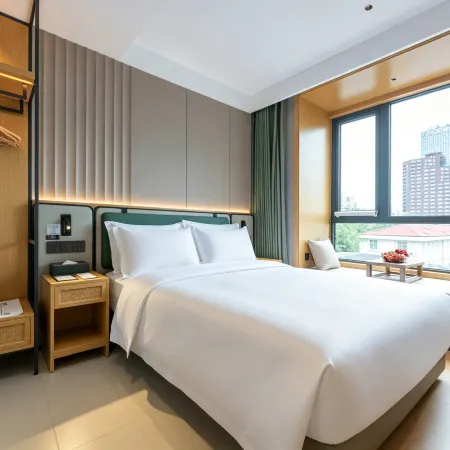Qiuguo Hotel (Beijing Sanlitun Taikoo Li Hujialou Metro Station Branch)