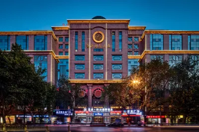 Huiyuan Jinjiang International Hotel Hotel di Stasiun Kereta