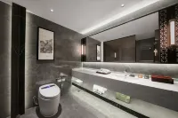 QIANNAHOTEL SPLENDOR（Zhengzhou East Railway Station Longzihu University District）