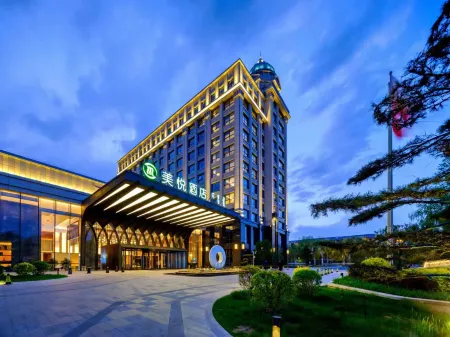 Hotel Manshi Meiyue Ordos Отели рядом с достопримечательностью «Mengguxiangqi Square»
