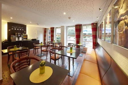 GHOTEL hotel & living Kiel Отели рядом с достопримечательностью «Кильский университет»