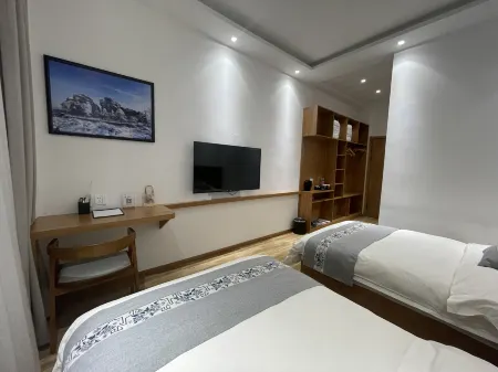 Mohe Yilan Fanghua Boutique Homestay Отели рядом с достопримечательностью «Сунхуа оригинальный лесной парк»