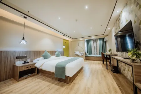 Yi Hu Hua Yuan Hotel Отели рядом с достопримечательностью «Yinchuan Han Meilin Art Museum»